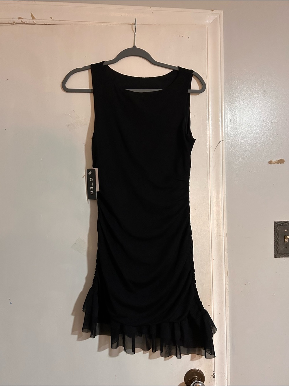 Amazon Black Sleeveless Ruched Mini Dress with Ruffle Hem